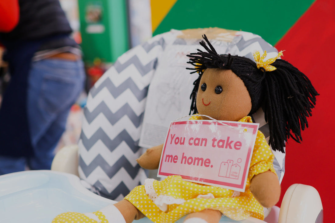 A donated doll: Psylo Helping Children In Need Through Little Village