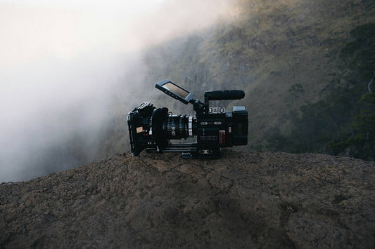 Black camera on a rock by Jakob Owens - earth day movies